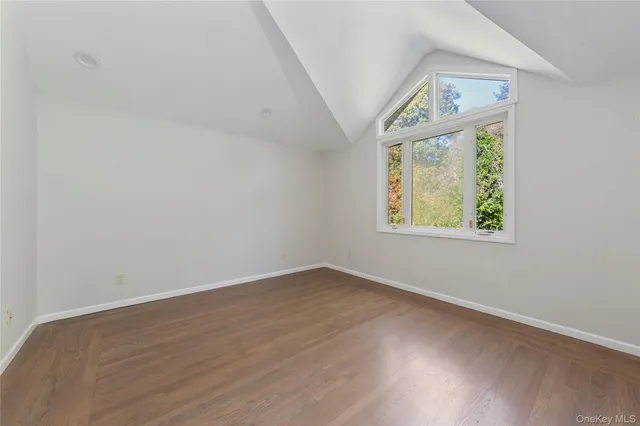 a bathroom with a sink a mirror and a shower