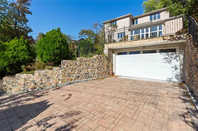 a view of a park with large trees