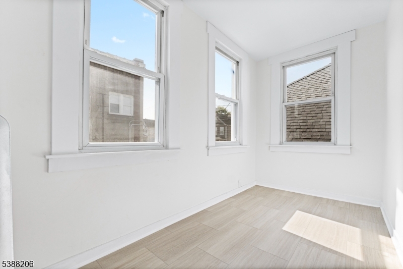 3202 Tremley Point Road Linden, NJ 07036 - Photo 31 of 41 a view of an empty room with a window