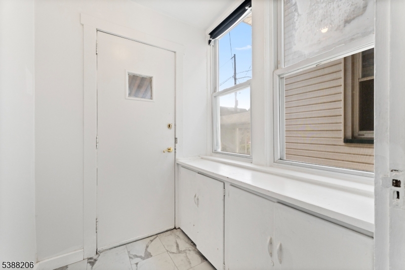 3202 Tremley Point Road Linden, NJ 07036 - Photo 34 of 41 a view of a window and cabinets