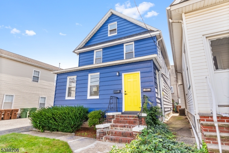 3202 Tremley Point Road Linden, NJ 07036 - Photo 4 of 41 a brick building with a large windows