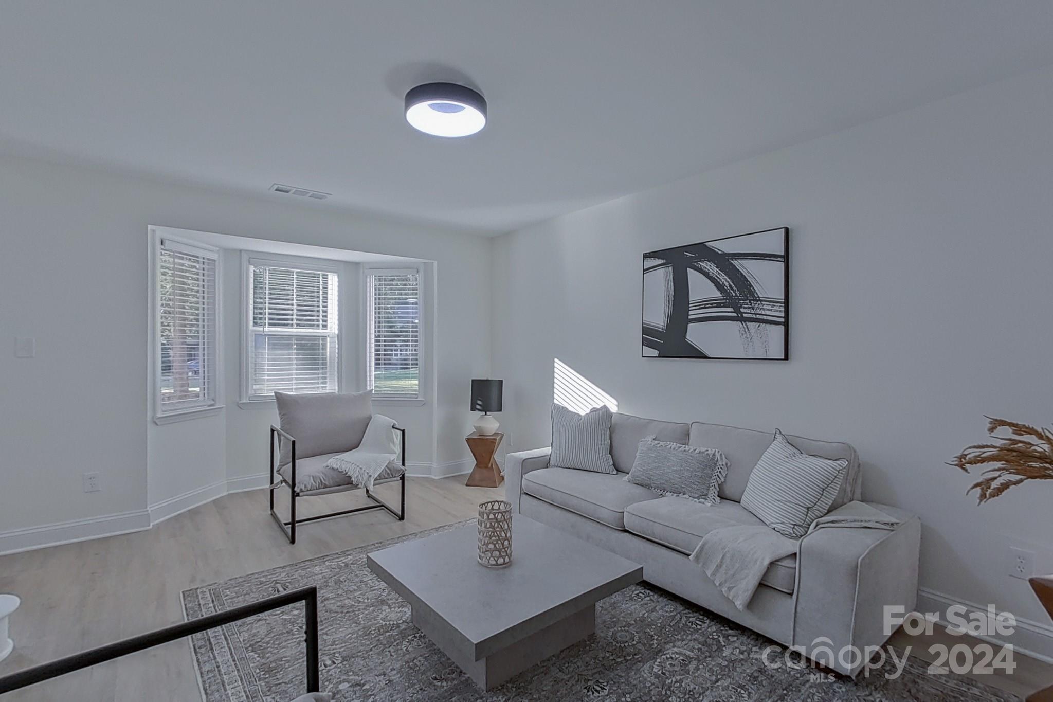 5710 Stream Ridge Drive Charlotte, NC 28269 - Photo 11 of 48 a living room with furniture