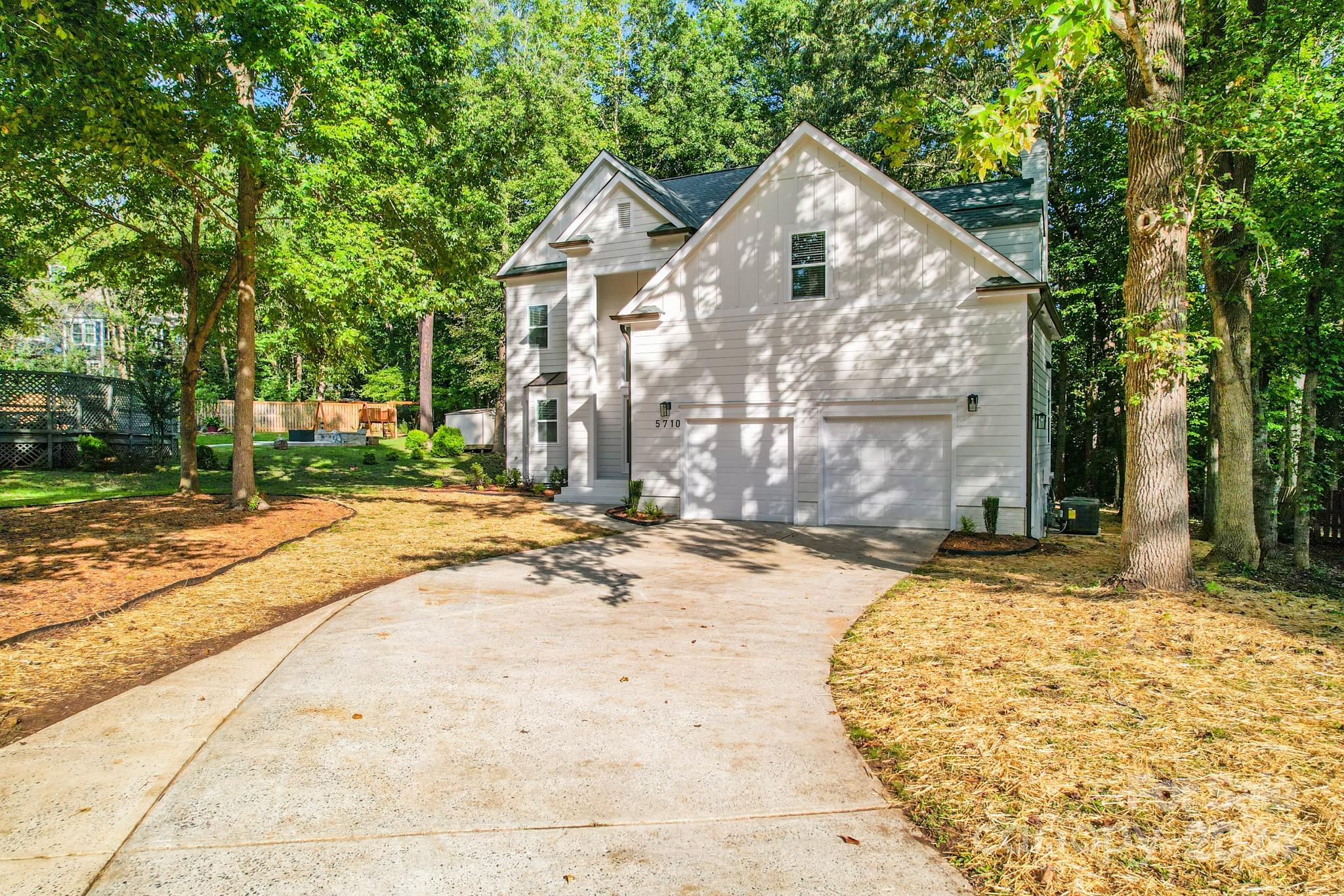 5710 Stream Ridge Drive Charlotte, NC 28269 - Photo 2 of 48 a view of a house with a patio