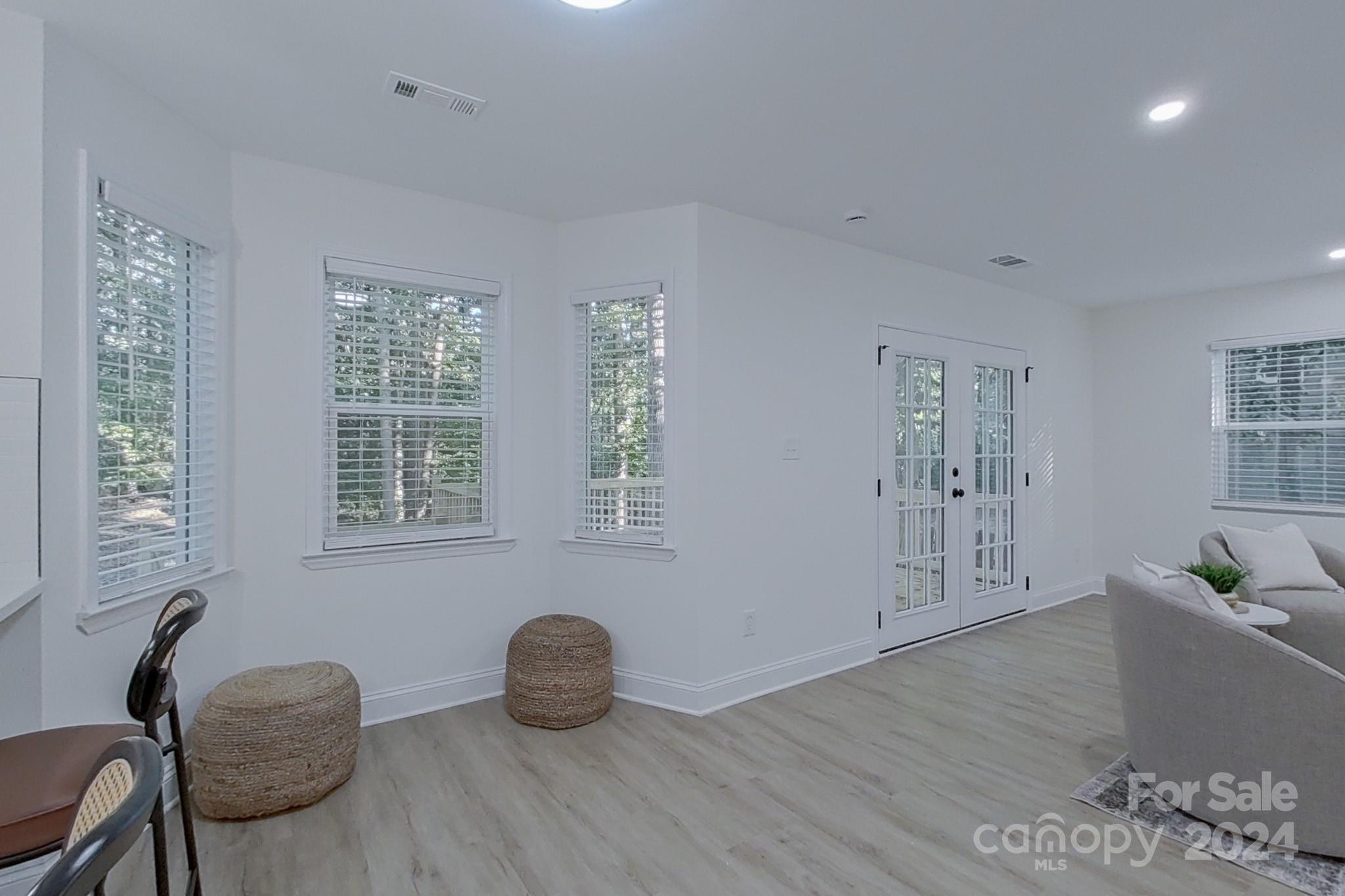 5710 Stream Ridge Drive Charlotte, NC 28269 - Photo 22 of 48 a room with furniture and a window