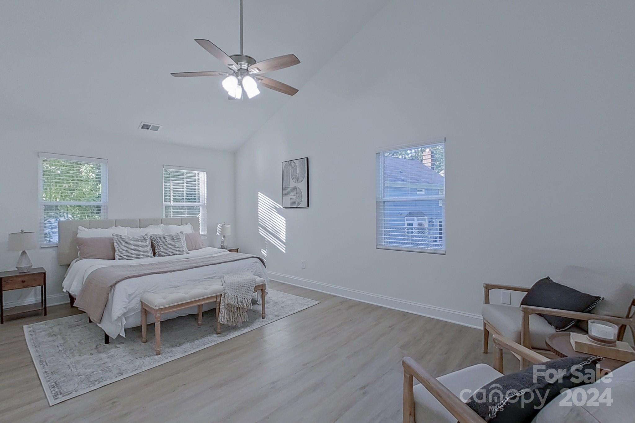 5710 Stream Ridge Drive Charlotte, NC 28269 - Photo 28 of 48 a bedroom with a bed and window
