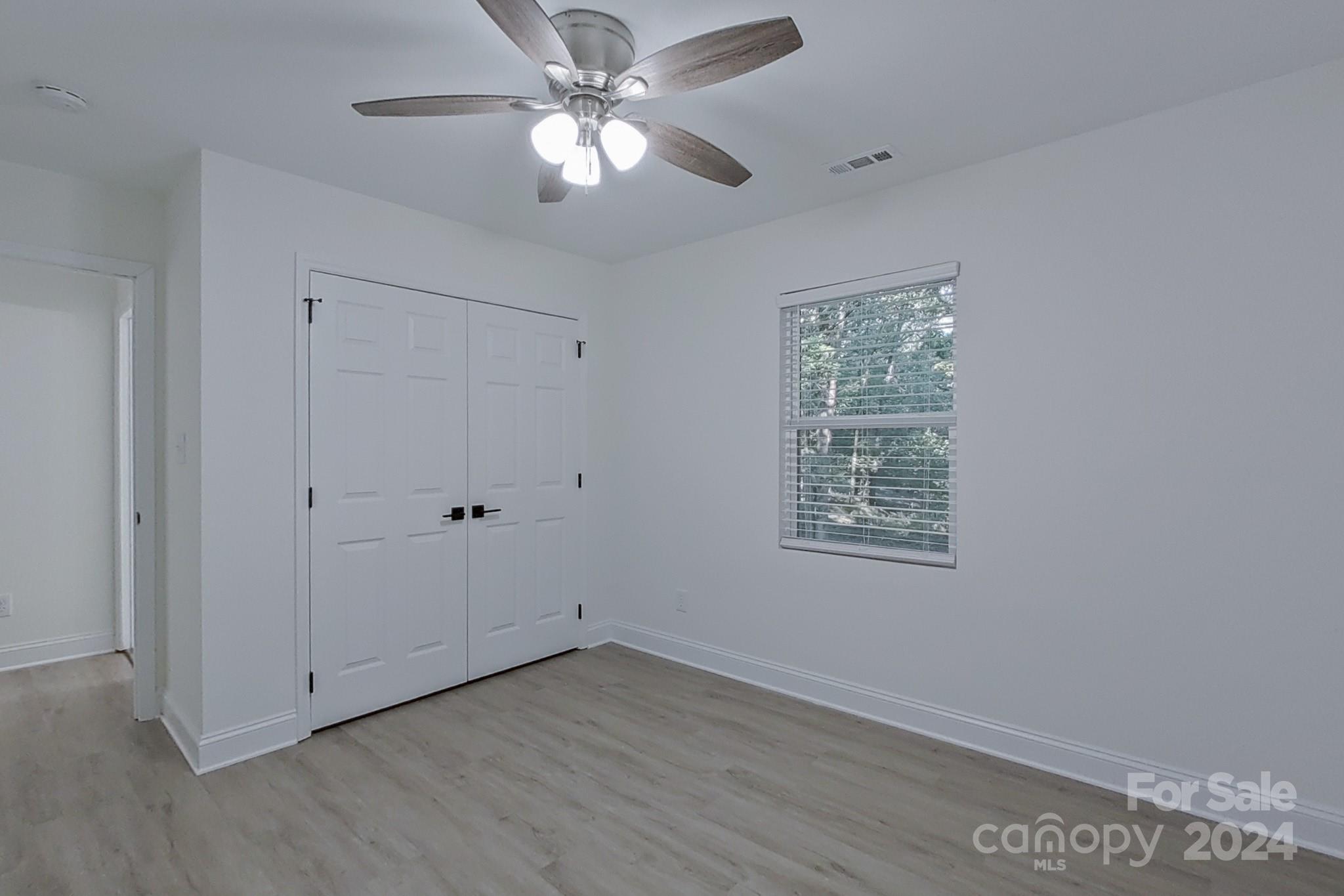 5710 Stream Ridge Drive Charlotte, NC 28269 - Photo 38 of 48 a view of an empty room with a window