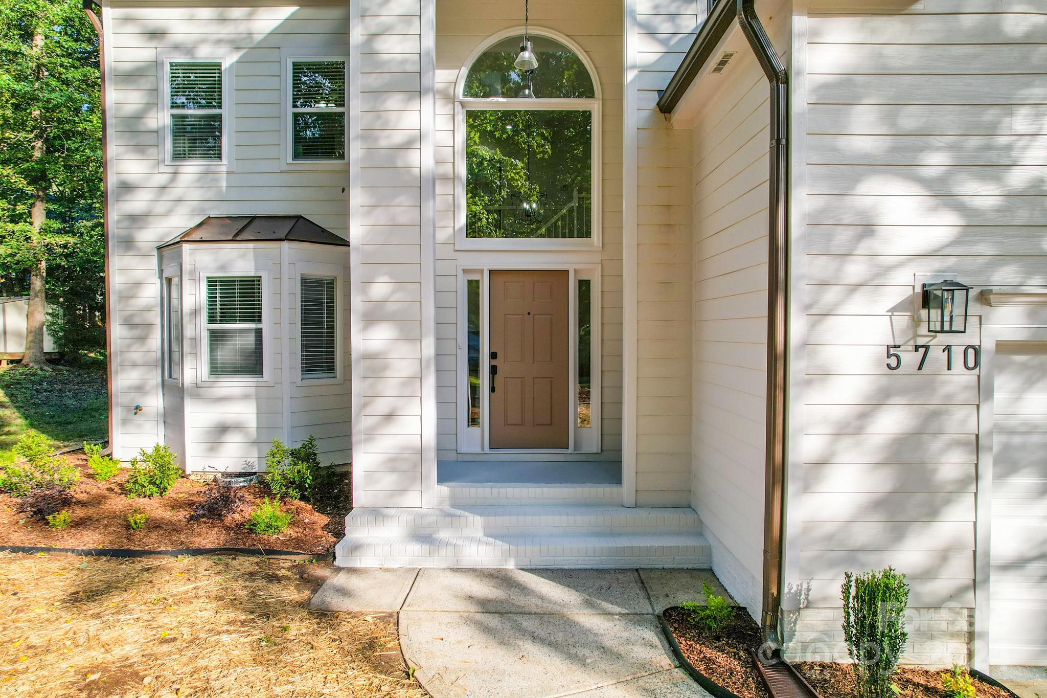 5710 Stream Ridge Drive Charlotte, NC 28269 - Photo 4 of 48 a front view of a house