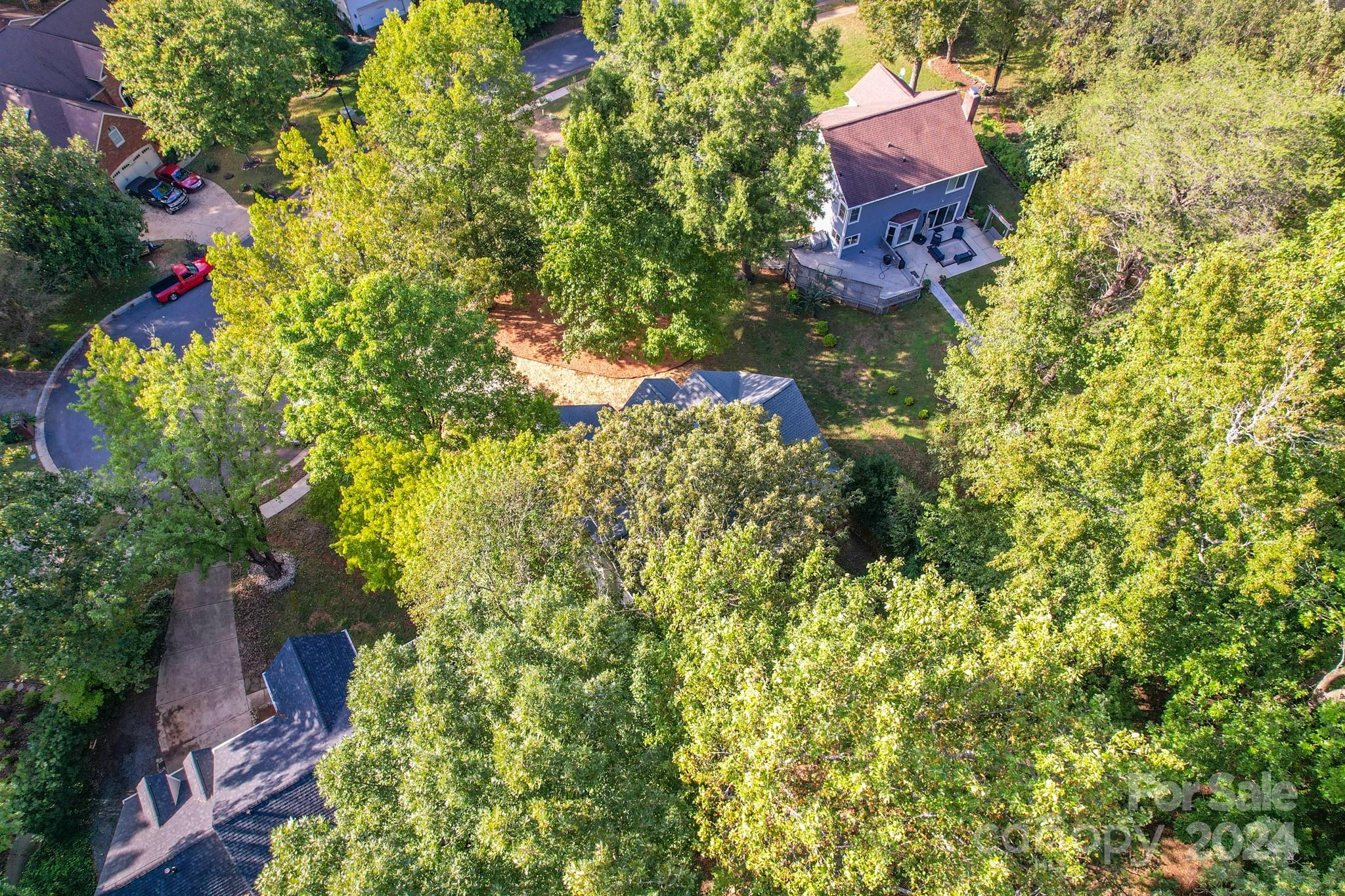 5710 Stream Ridge Drive Charlotte, NC 28269 - Photo 47 of 48 a bird view of a house next to a yard