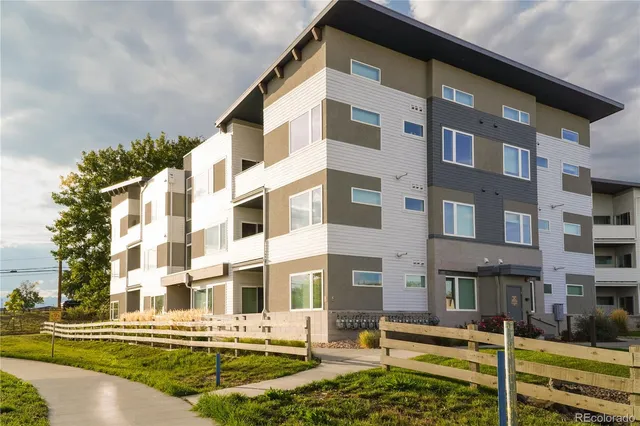 a front view of a building with street view
