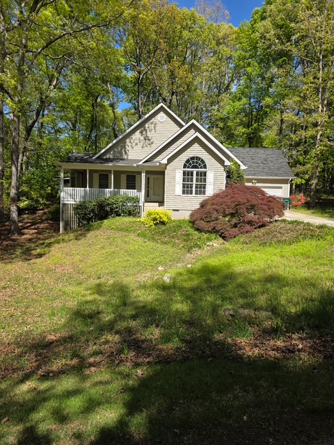 905 North Crestview Drive Seneca, SC 29678 - Photo 16 of 16 This charming residence offers a peaceful retreat with lush greenery and welcoming front porch.