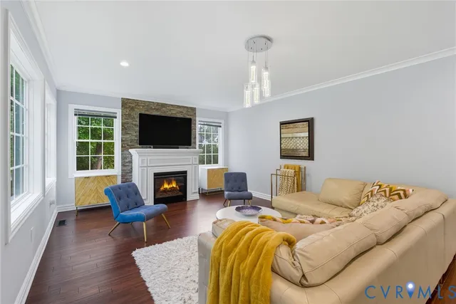 a bedroom with furniture and a fireplace