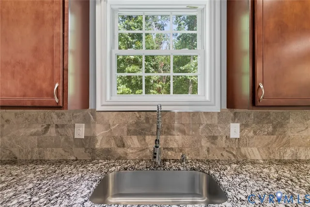 a bathroom with sink and bathtub