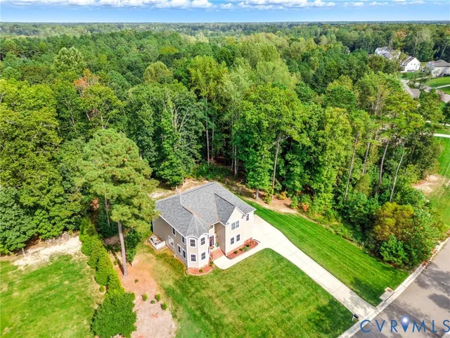 a view of a house with a big yard