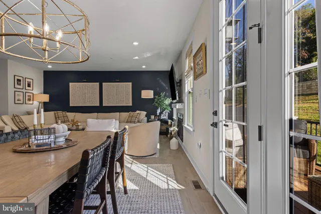 a very nice looking dining room with a table and chairs