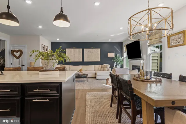 a kitchen with a table and chairs in it