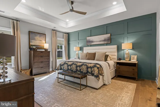 a bedroom with a bed and furniture