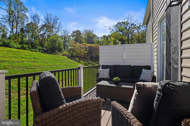 a view of a patio in backyard of the house