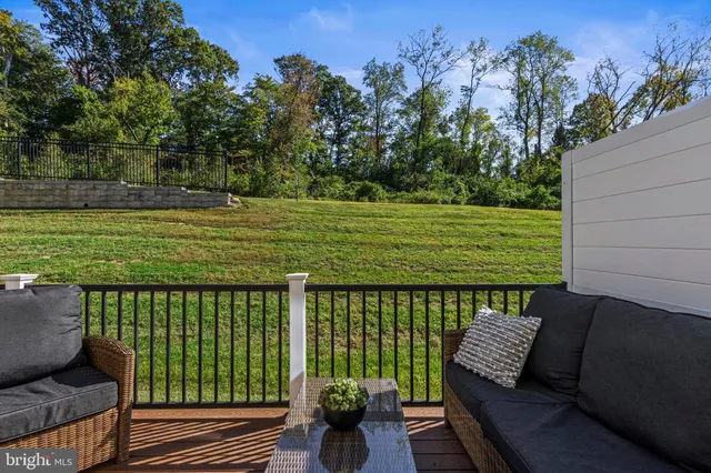 a view of a two chairs in the roof deck