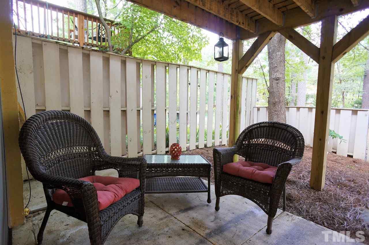 5803 Mapleridge Road Raleigh, NC 27609 - Photo 16 of 23 a outdoor living space with furniture and garden view