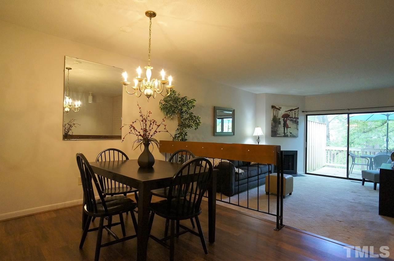 5803 Mapleridge Road Raleigh, NC 27609 - Photo 5 of 23 a dining room with furniture and window