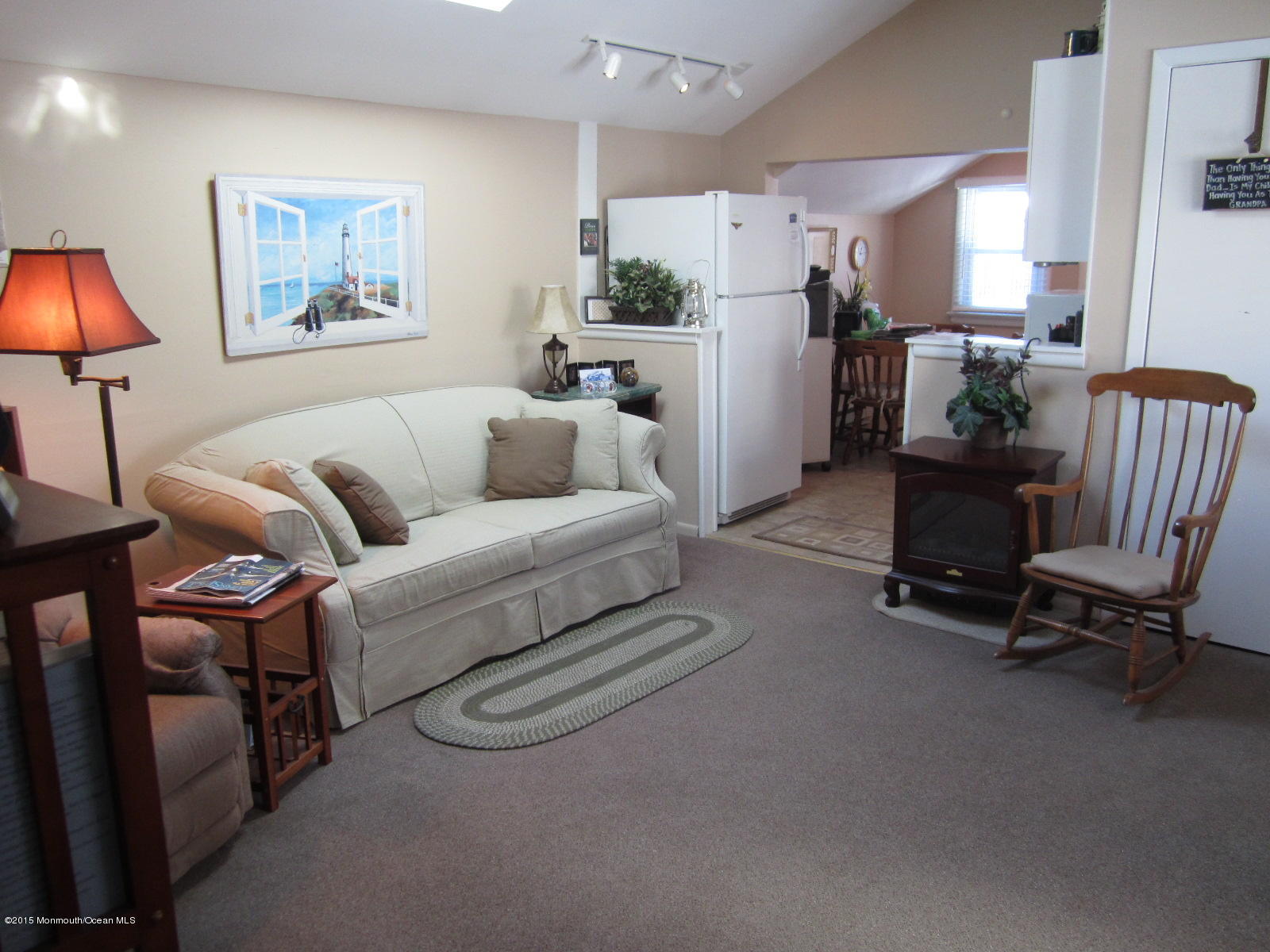 a living room with furniture and a couch
