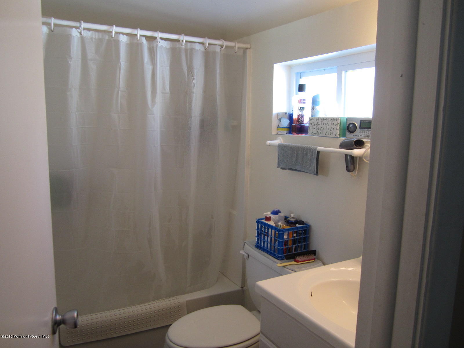115 10th Avenue Spring Lake Heights, NJ 07762 - Photo 2 of 15 a bathroom with a sink and toilet