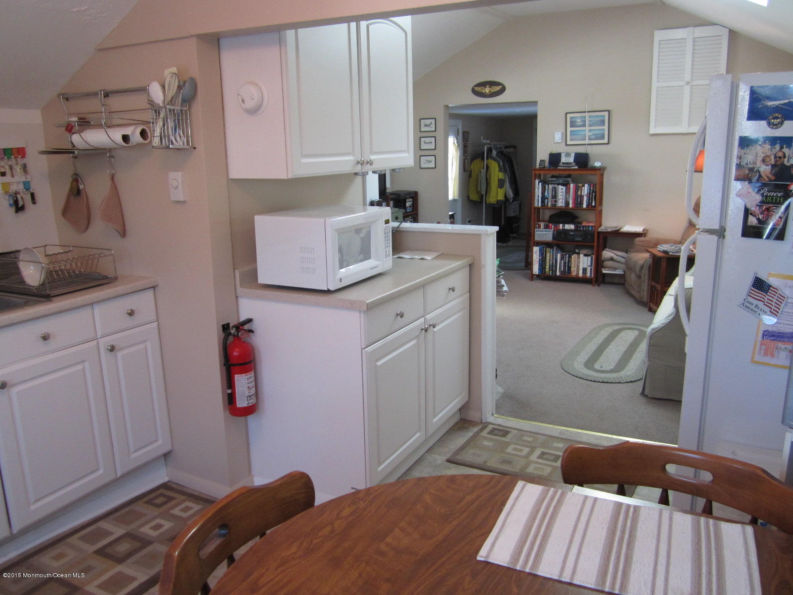 115 10th Avenue Spring Lake Heights, NJ 07762 - Photo 5 of 15 a bedroom with bed and cabinets