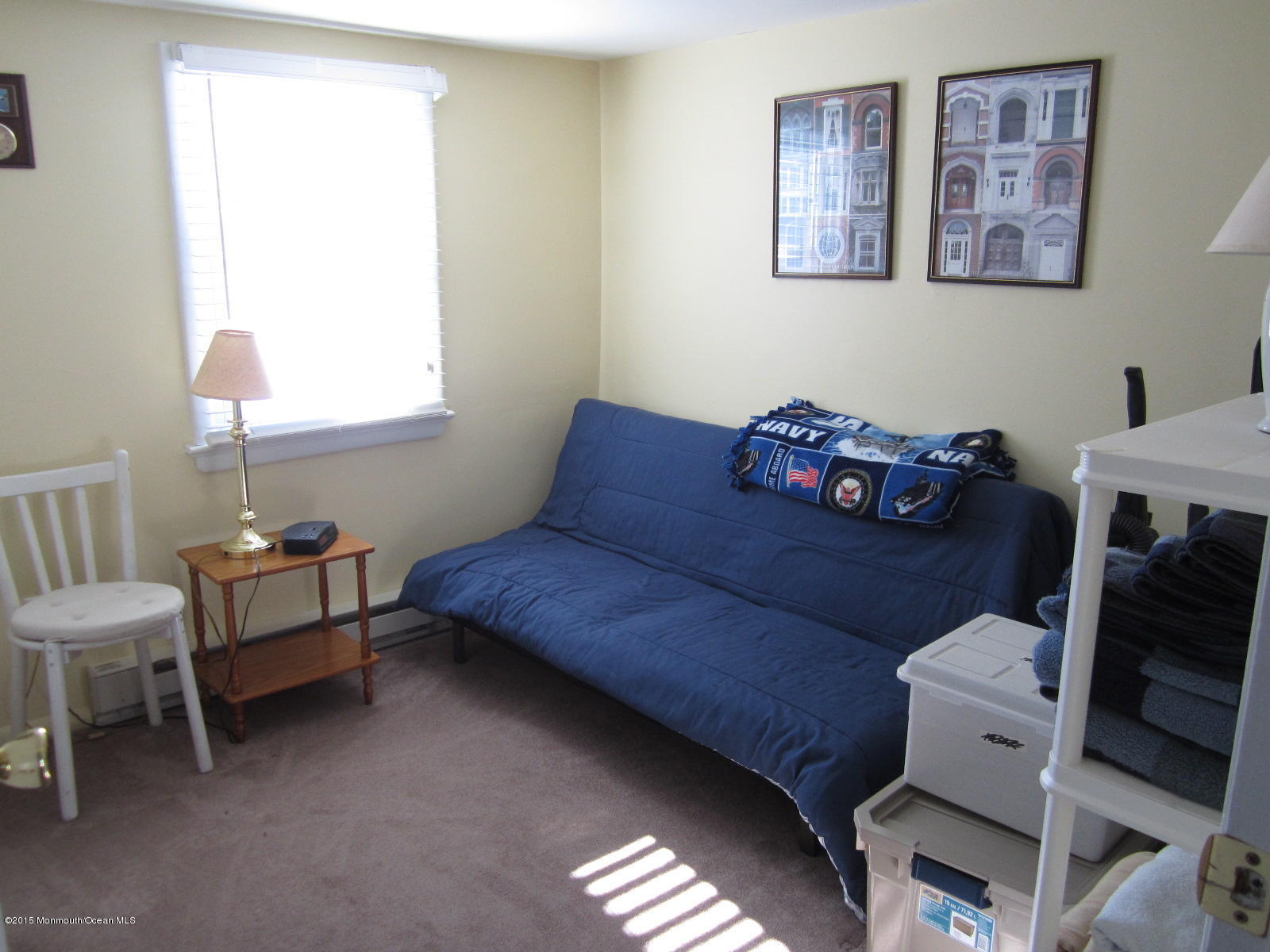 115 10th Avenue Spring Lake Heights, NJ 07762 - Photo 6 of 15 a bedroom with furniture and a window