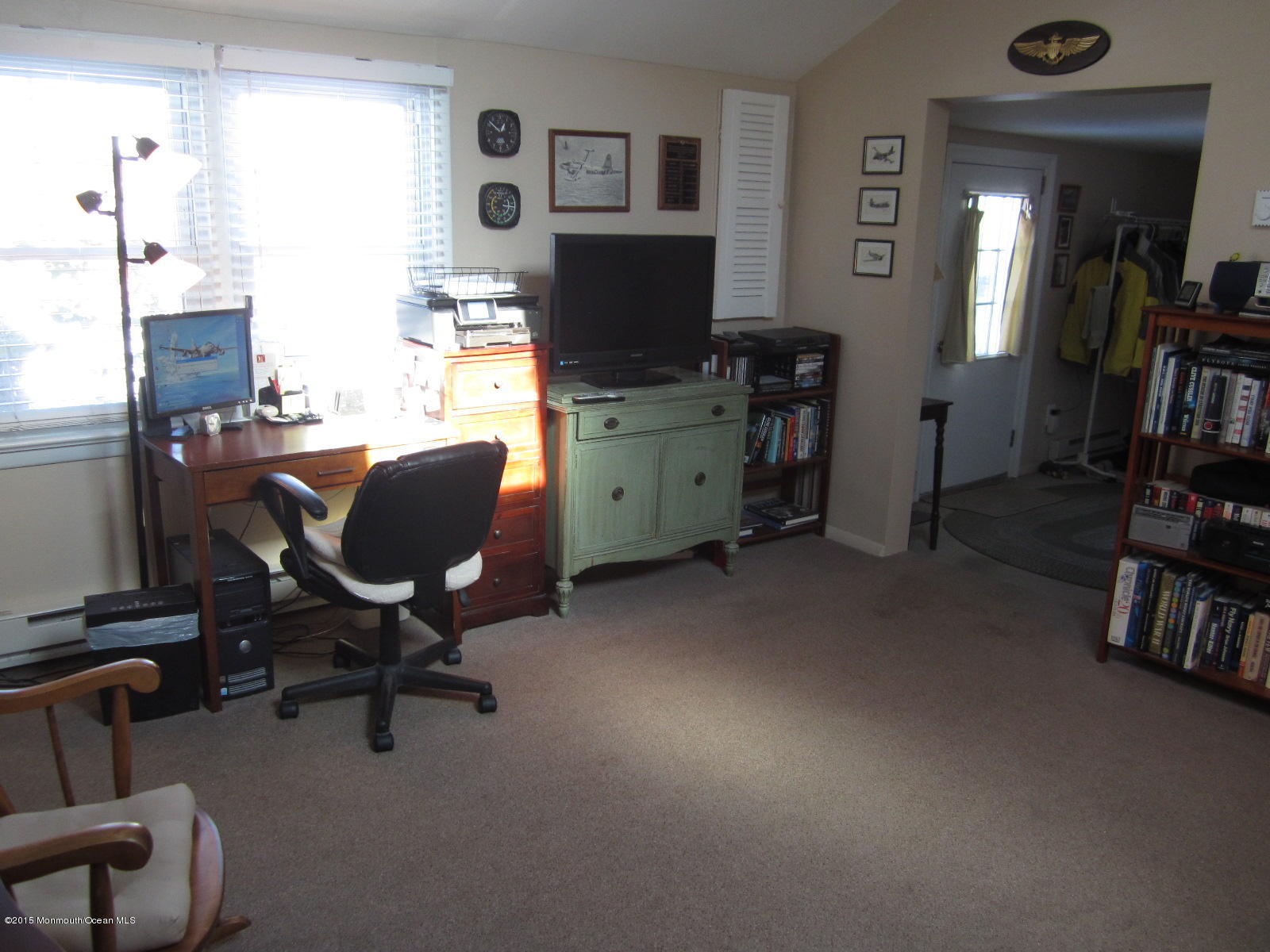115 10th Avenue Spring Lake Heights, NJ 07762 - Photo 9 of 15 a view of a workspace with furniture and a window