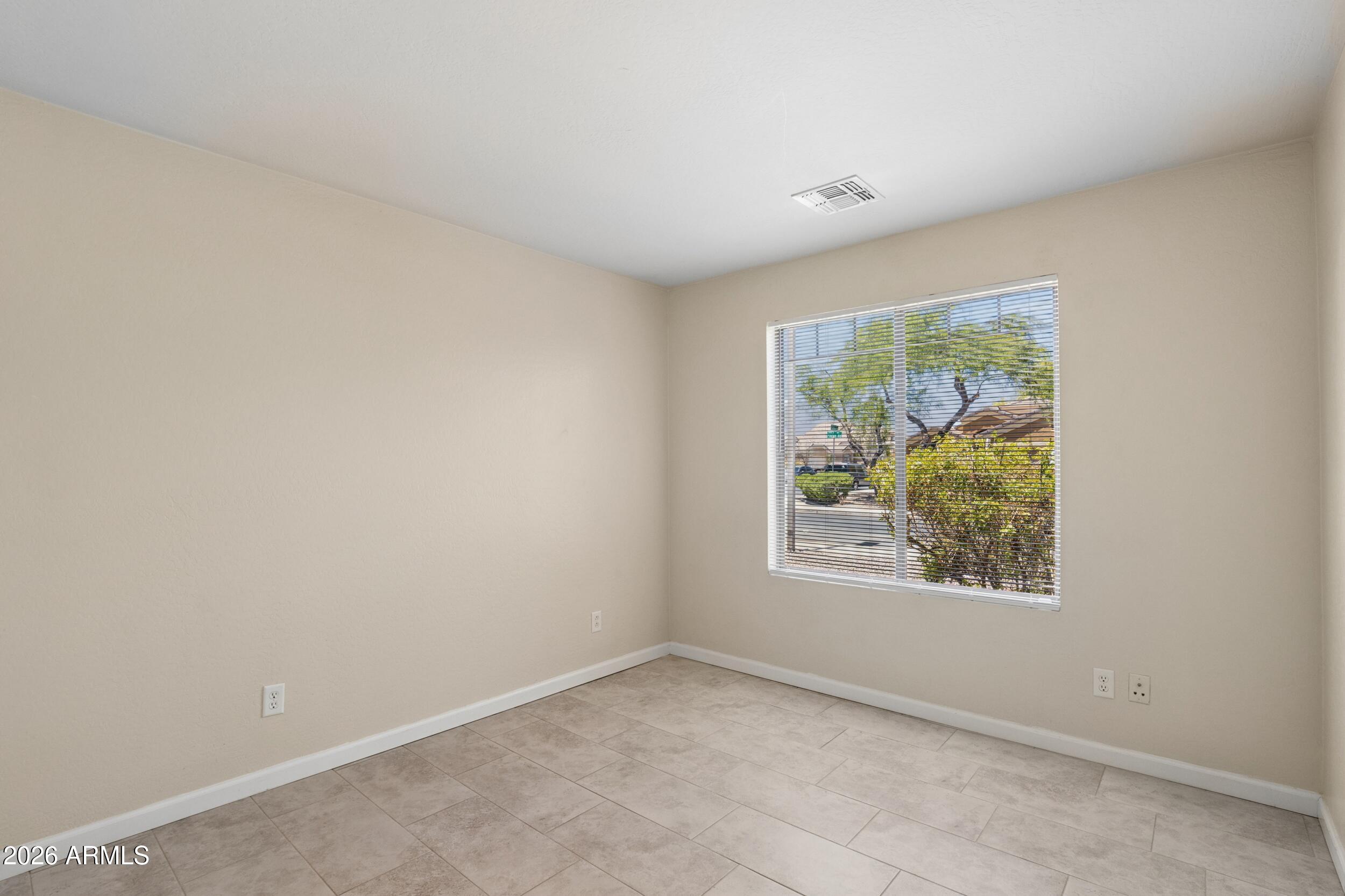 24025 West Pecan Road Buckeye, AZ 85326 - Photo 34 of 42 Looking into Bedroom 3
