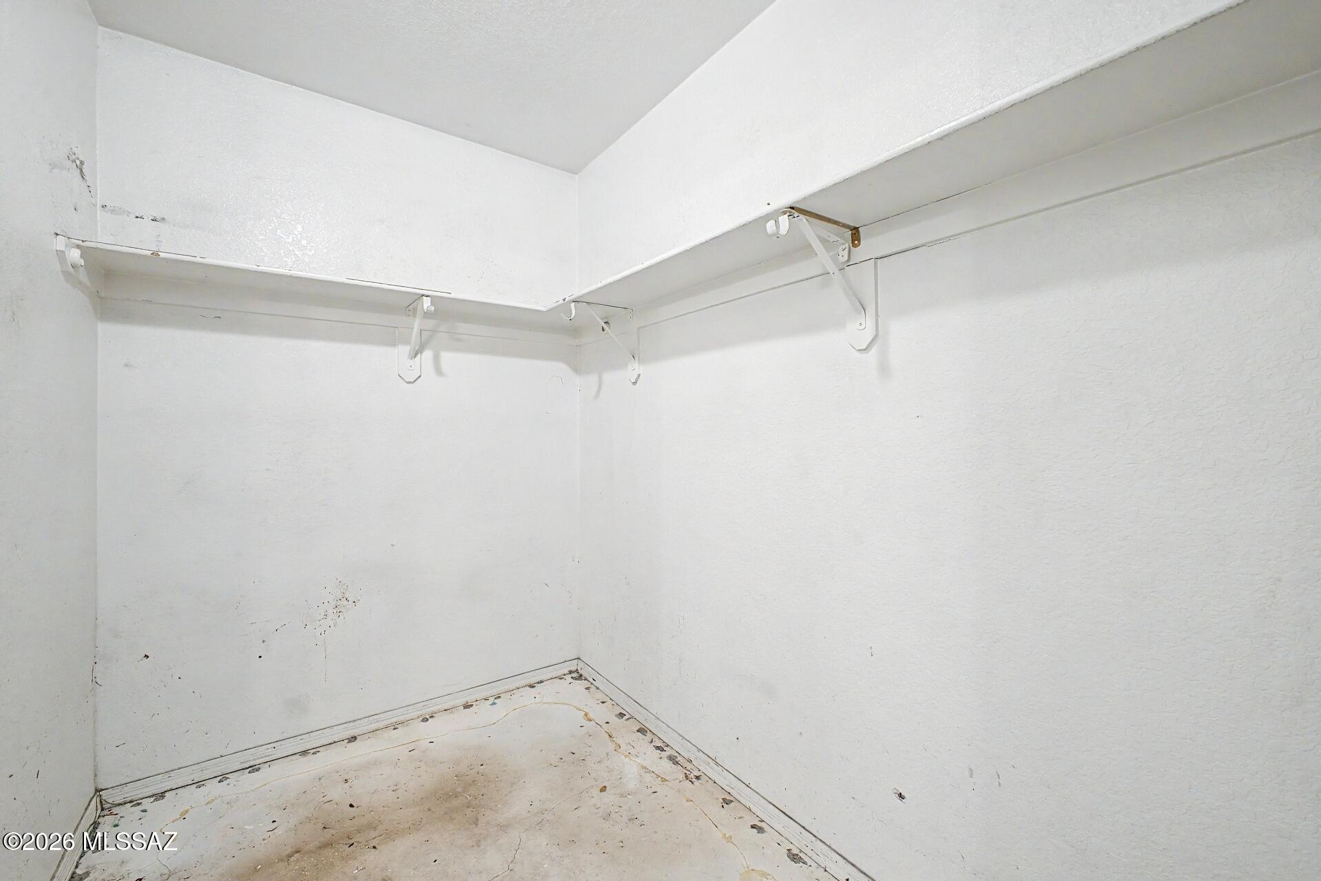 9810 East Stonehaven Way Tucson, AZ 85747 - Photo 19 of 27 a view of a room with racks on the wall