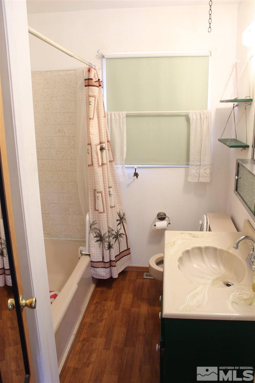 14580 Seminole Trail Reno, NV 89521 - Photo 15 of 21 a bathroom with a sink and a shower