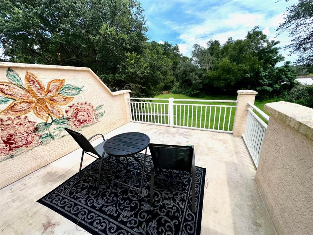 891 East Rembrandt Way Inverness, FL 34453 - Photo 26 of 27 swimming pool view with a seating space