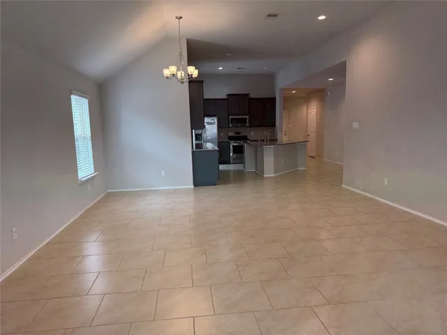 a view of a livingroom with a furniture