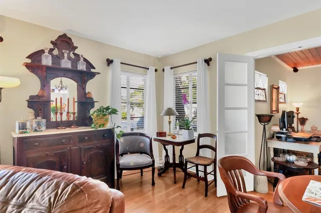 a view of a livingroom with furniture and workspace