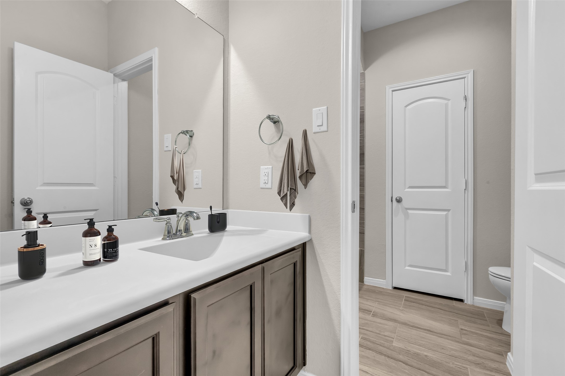 14304 Prospect Park Lane Conroe, TX 77384 - Photo 22 of 38 a bathroom with a sink and a mirror