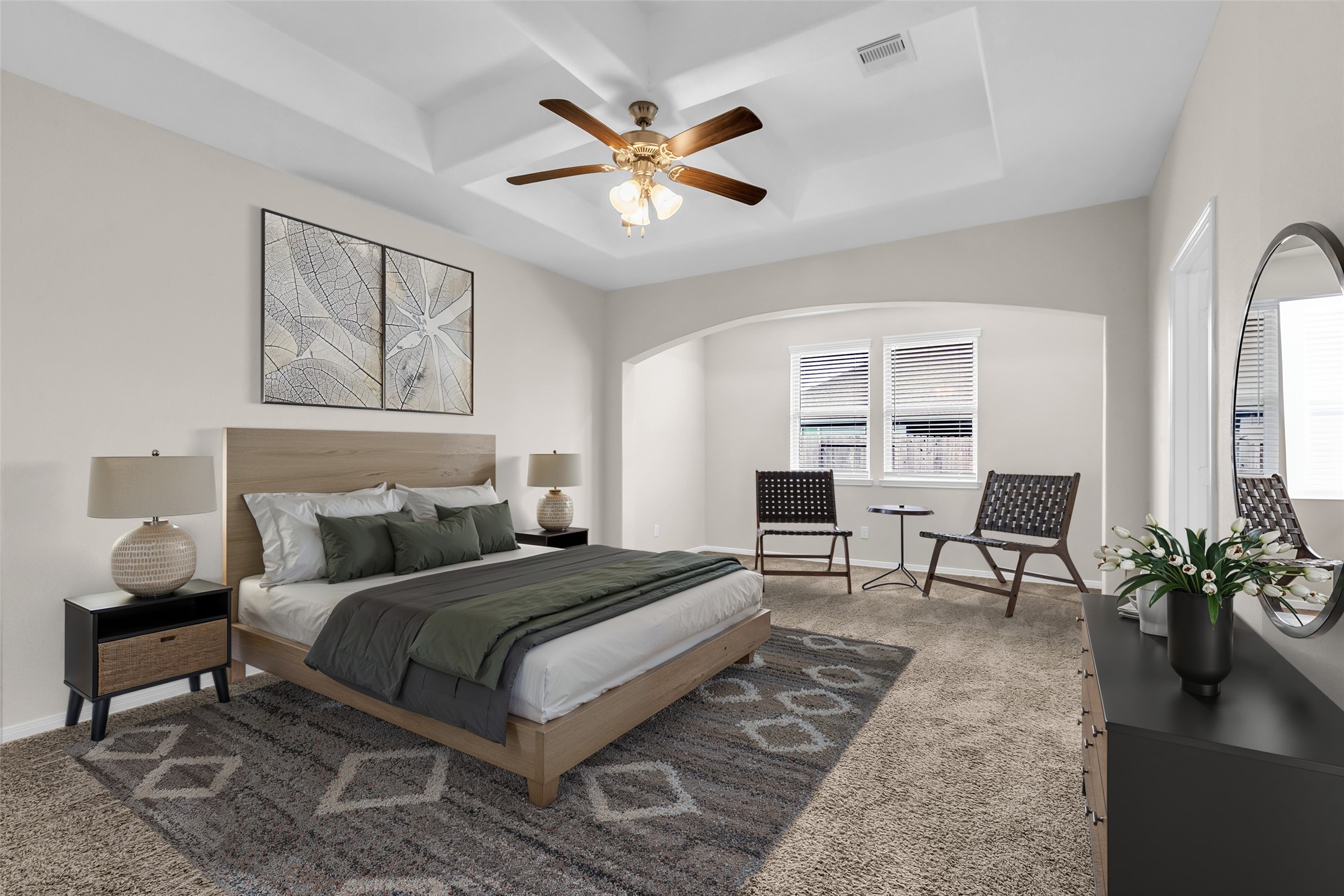 14304 Prospect Park Lane Conroe, TX 77384 - Photo 24 of 38 a bedroom with a bed and a chandelier