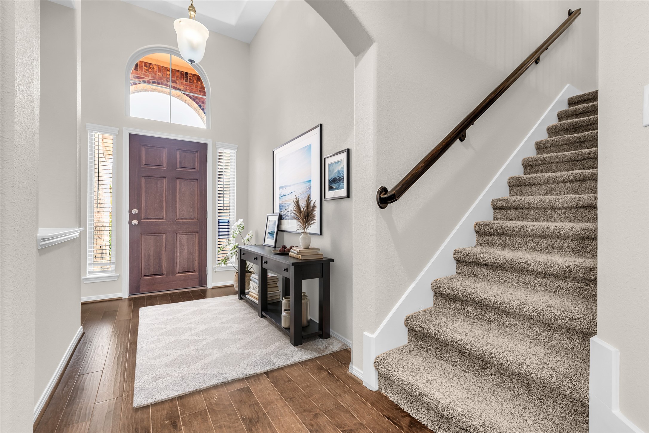 14304 Prospect Park Lane Conroe, TX 77384 - Photo 4 of 38 a view of entryway and hall with wooden floor