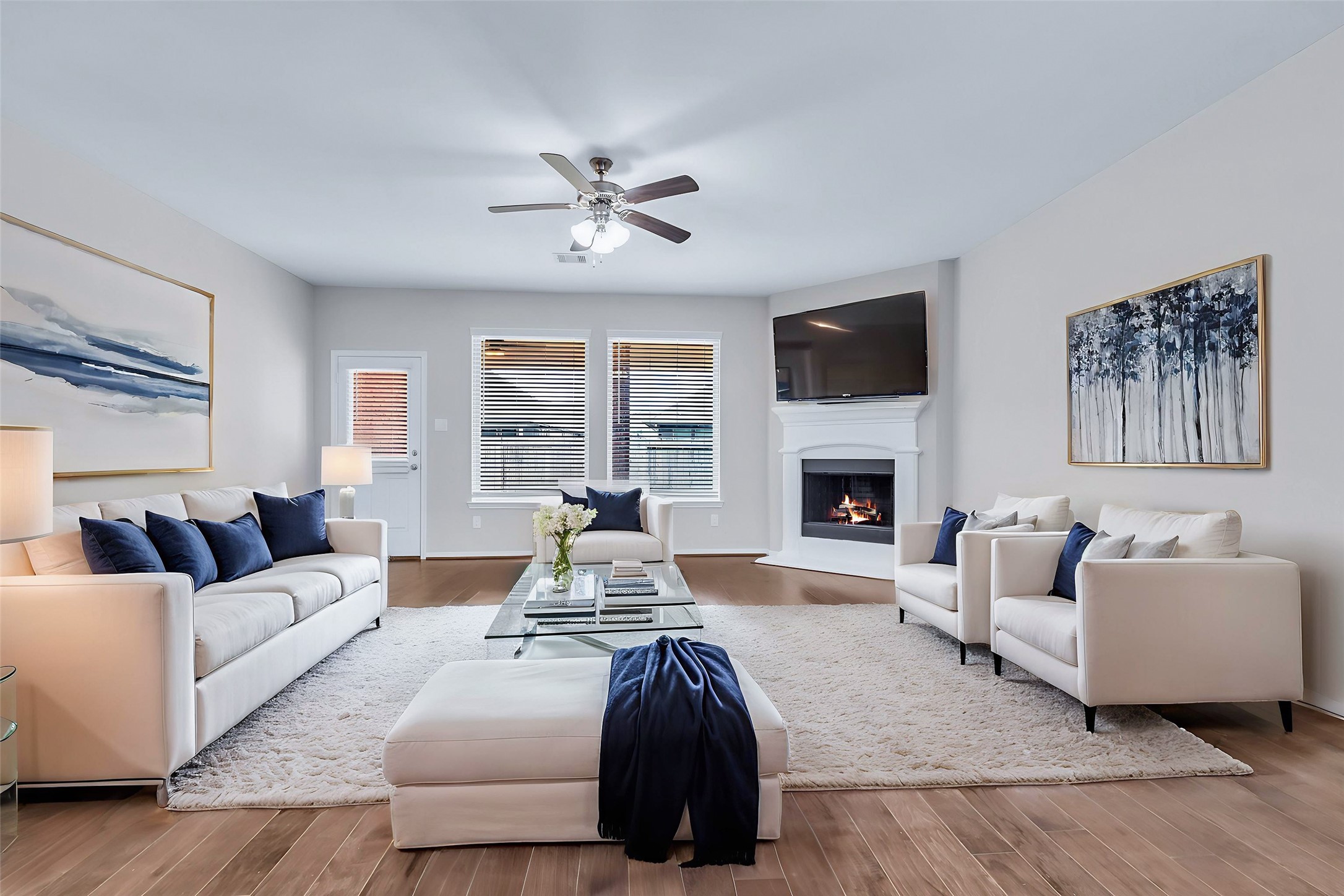 14304 Prospect Park Lane Conroe, TX 77384 - Photo 6 of 38 a living room with furniture fireplace and flat screen tv