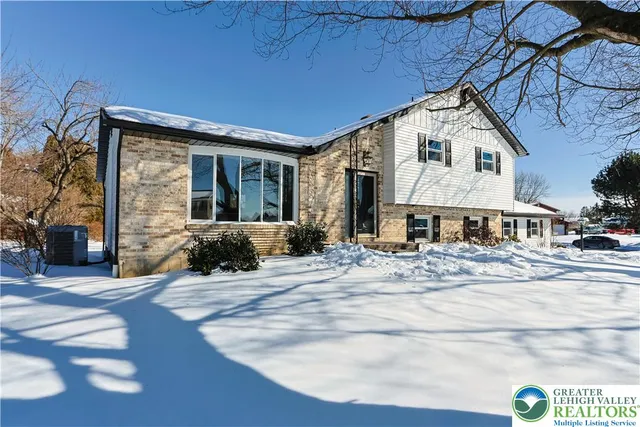 a view of a house with a patio
