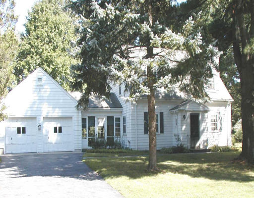 18 Applecrest Road Weston, MA 02493 - Photo 1 of 1 a front view of a house with a yard
