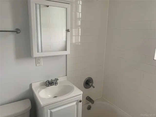 a bathroom with a sink and a toilet