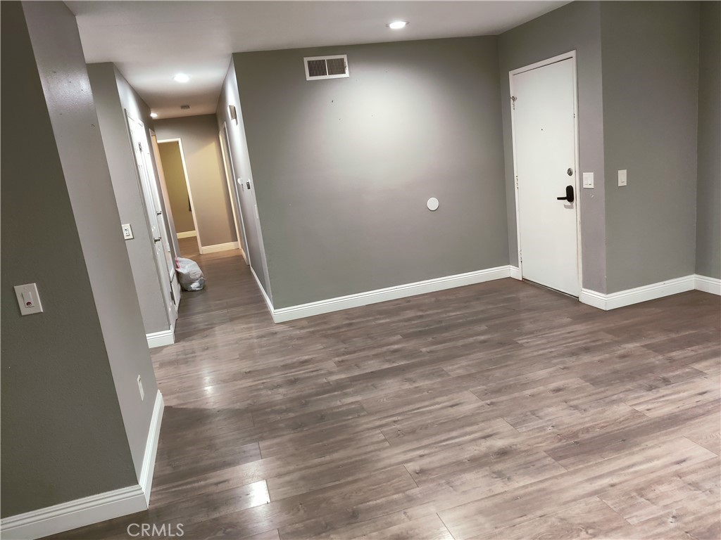 1806 Morning Canyon Road Diamond Bar, CA 91765 - Photo 4 of 16 wooden floor in a hall with an entryway