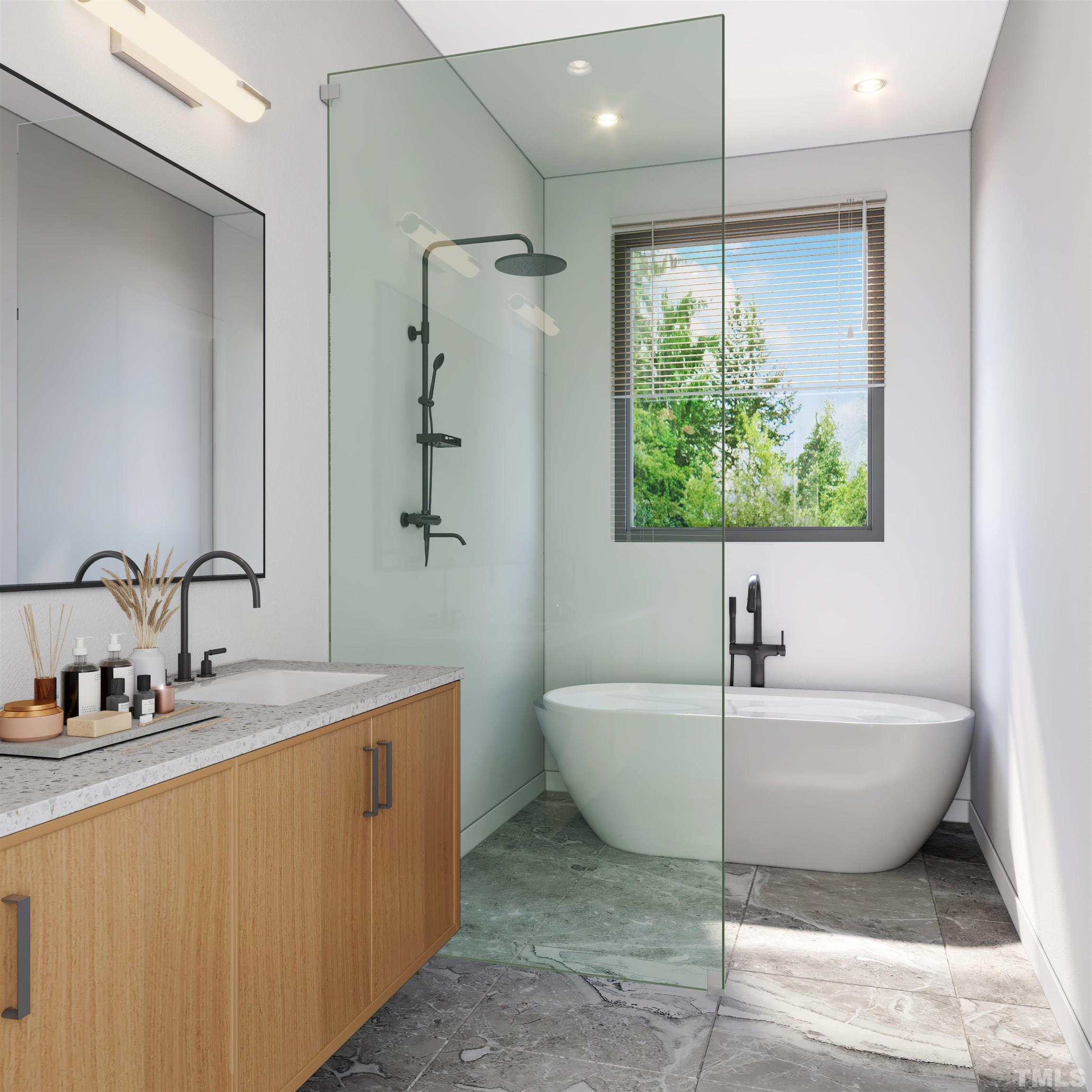 907 North State Street, Unit 102 Raleigh, NC 27604 - Photo 4 of 13 a spacious bathroom with a bathtub and sink