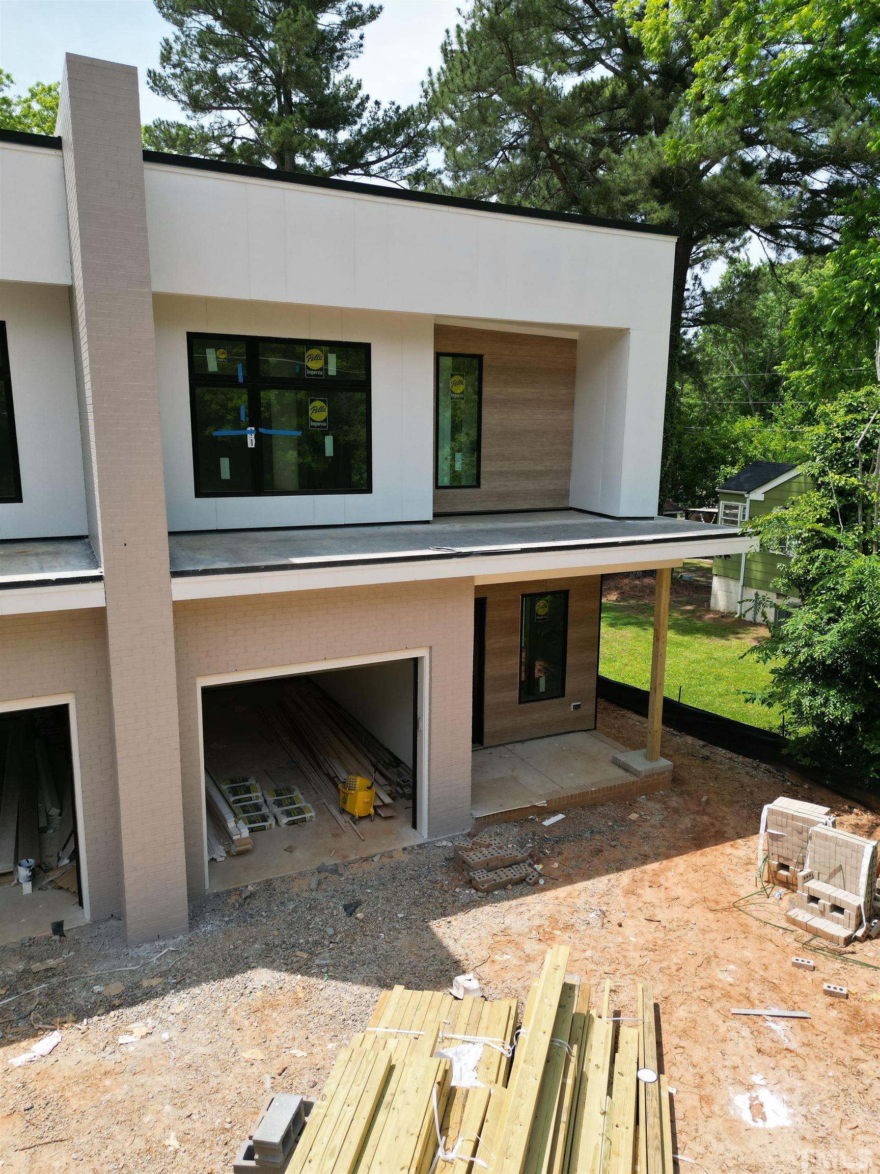 907 North State Street, Unit 102 Raleigh, NC 27604 - Photo 8 of 13 a view of house with outdoor space