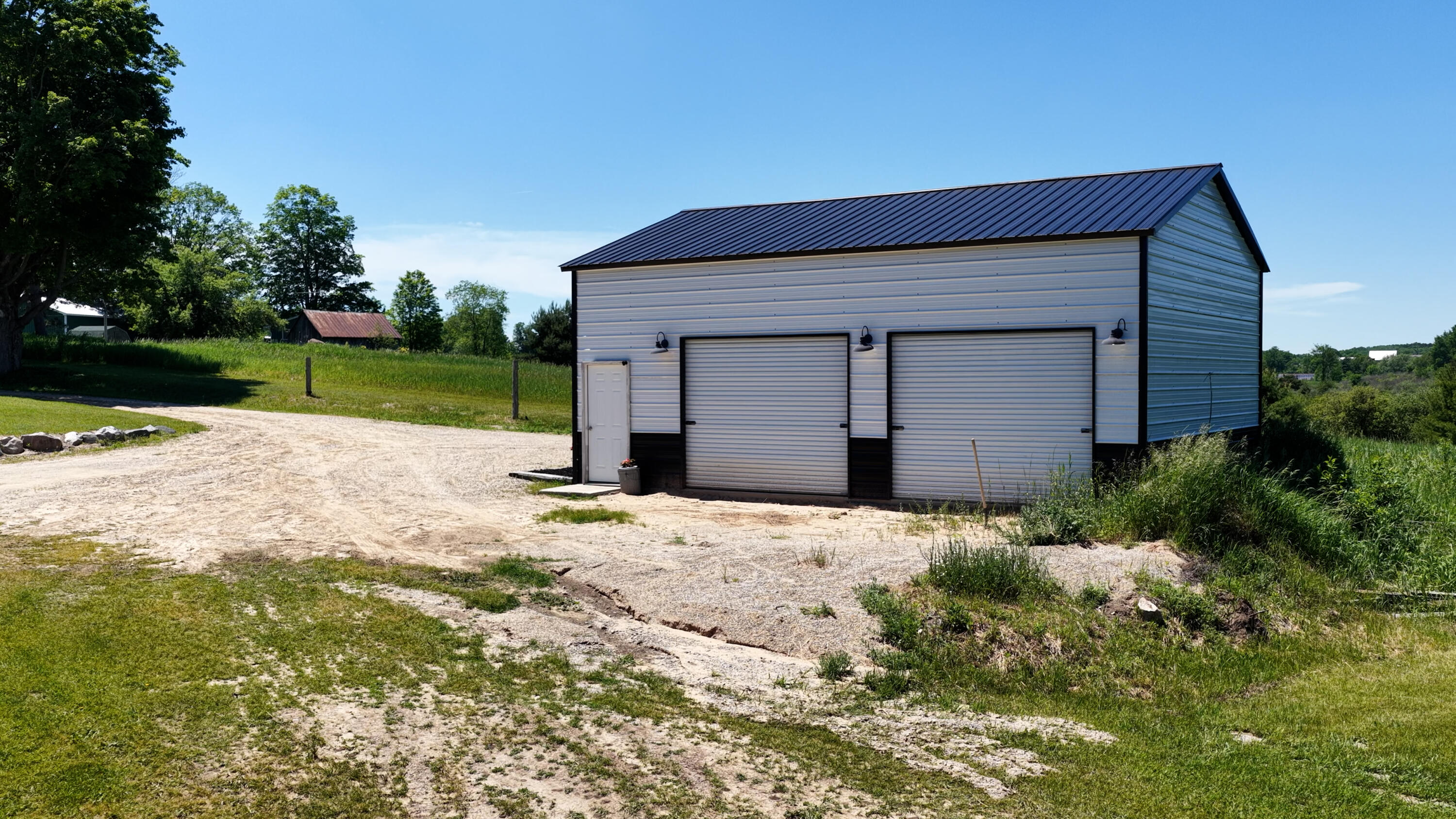 17274 Wilson Road Big Rapids, MI 49307 - Photo 33 of 51 DJI_20260608054318_0075_D.00_13_38_56.St