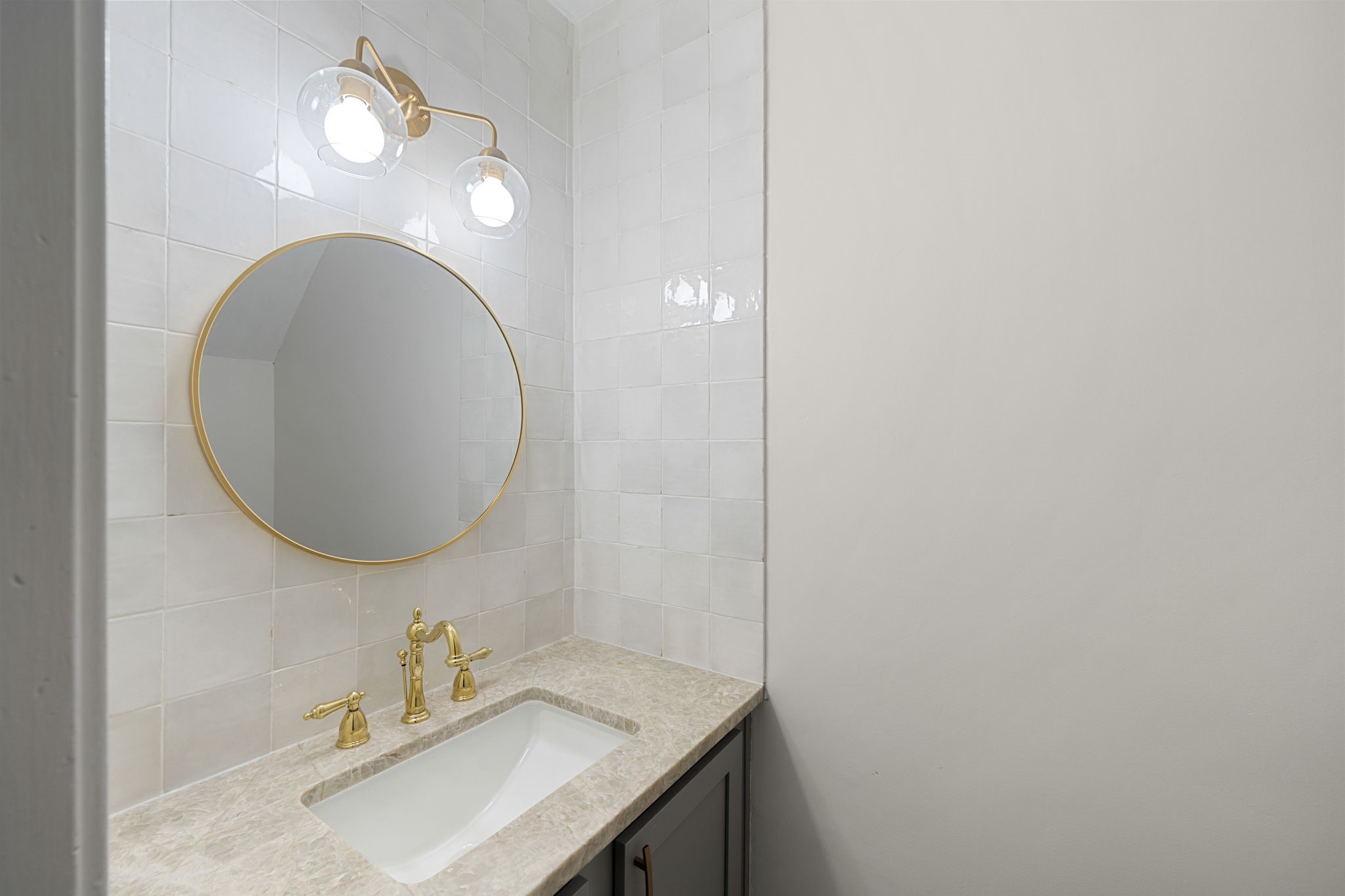 11550 Chimney Rock Road, Unit 521 Houston, TX 77035 - Photo 15 of 30 a bathroom with a sink and a mirror