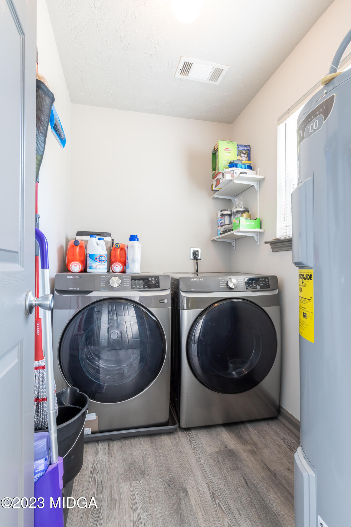 128 Samuel Barber Road Jackson, GA 30233 - Photo 15 of 27 a kitchen with a cabinets and appliances
