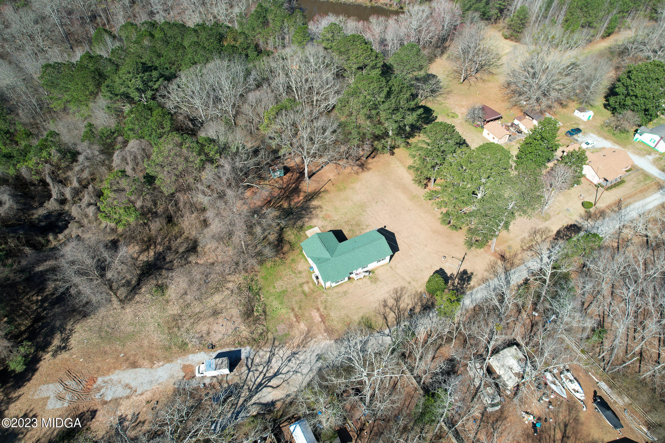 128 Samuel Barber Road Jackson, GA 30233 - Photo 3 of 27 an aerial view of a house with a yard
