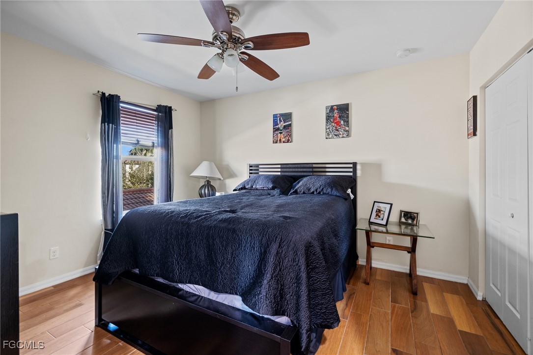 8657 Sumner Avenue Fort Myers, FL 33908 - Photo 23 of 29 a bedroom with a bed and a window